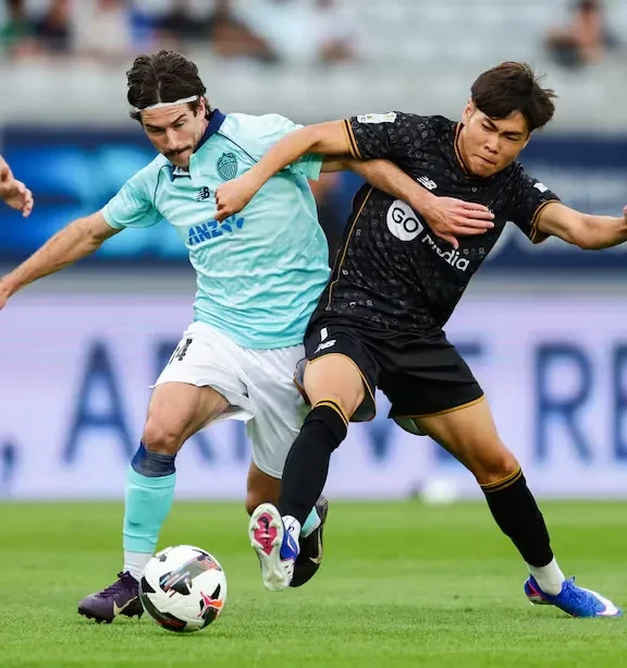 South Island United competing in the black away kit