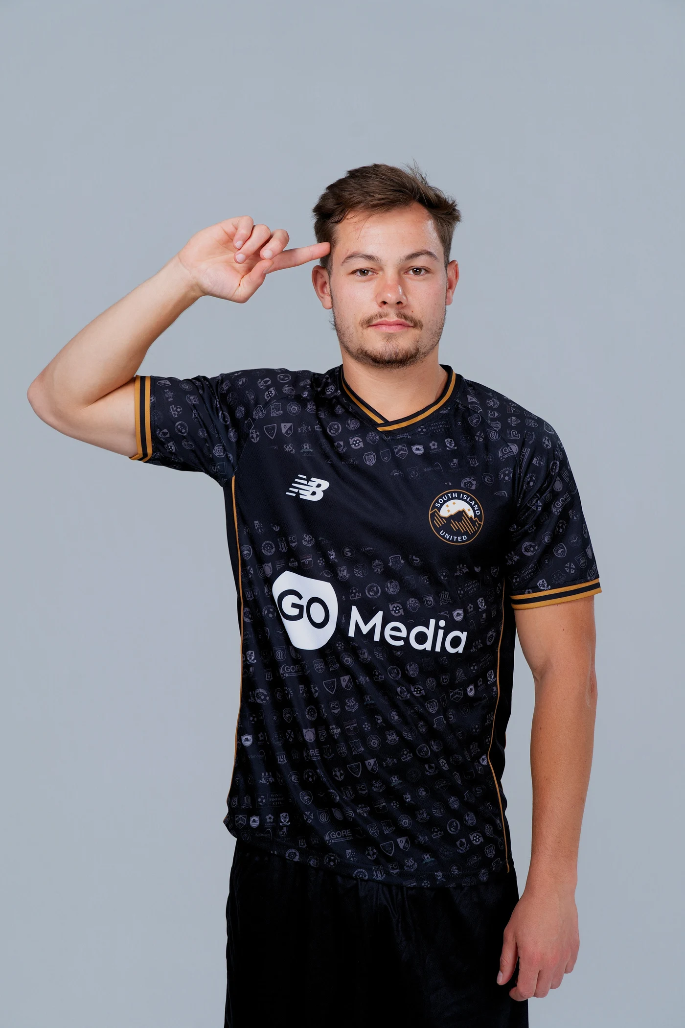 South Island United player in the club’s black away jersey