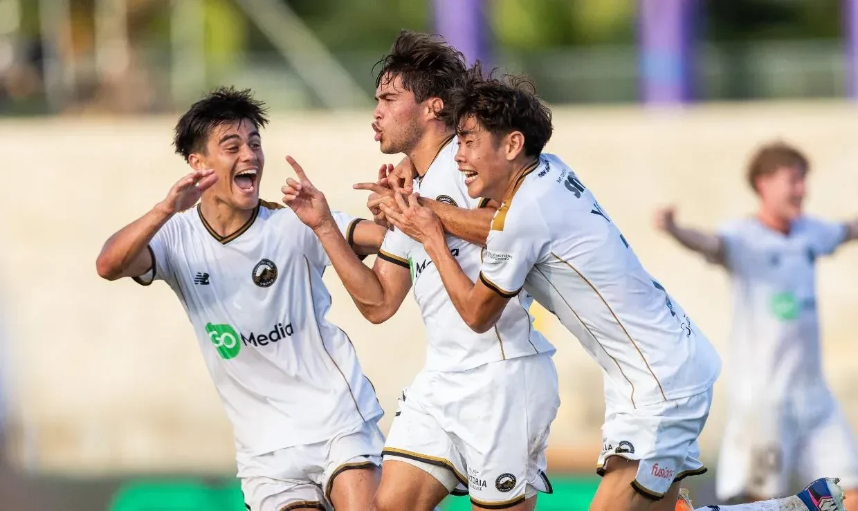 South Island United players celebrating a goal